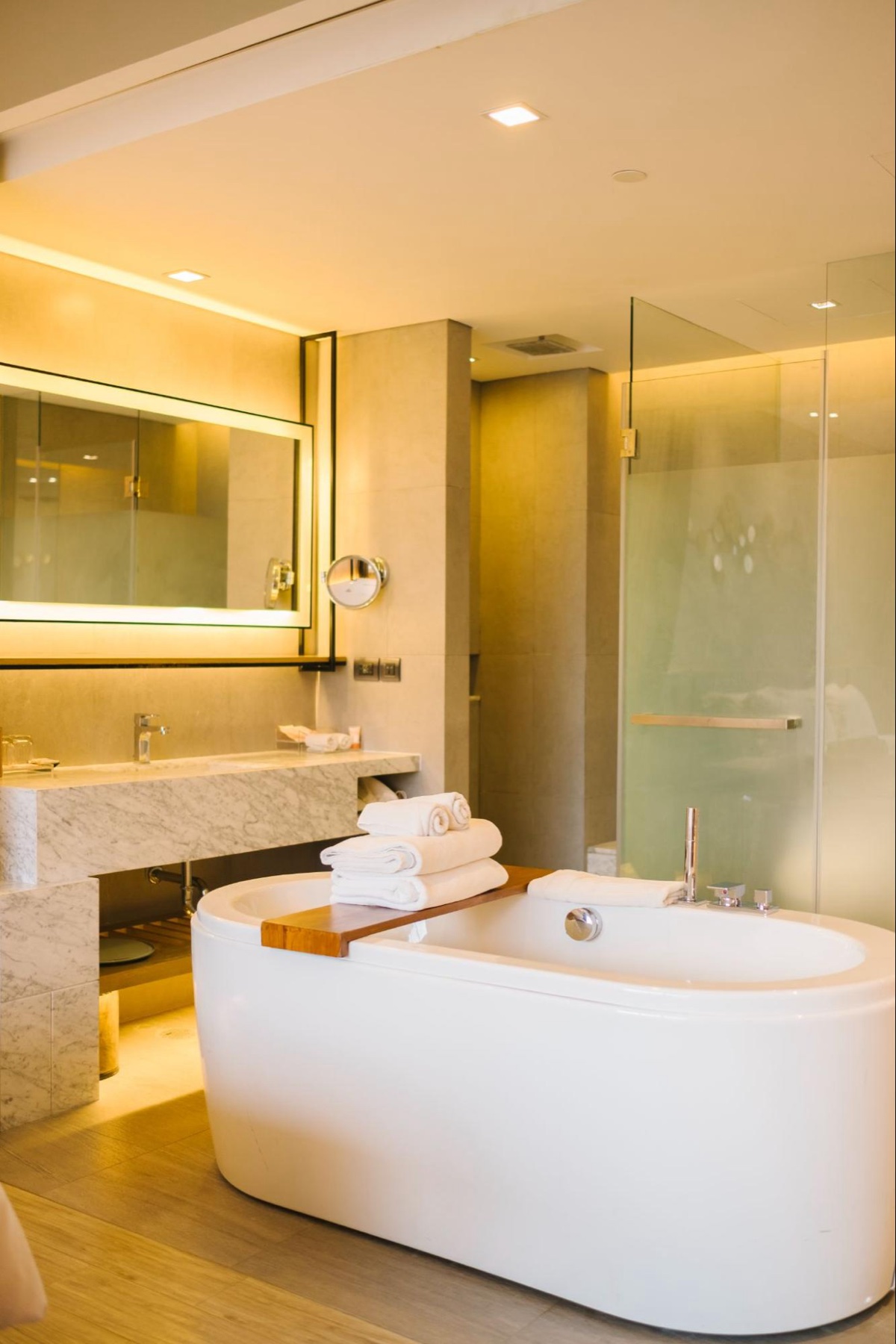 Freestanding tub and marble vanity finished by Canyon Plumbing & Heating